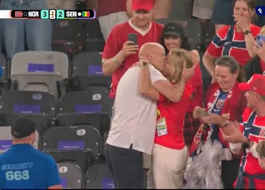 Norway manager Stale Solbakken kisses wife after match