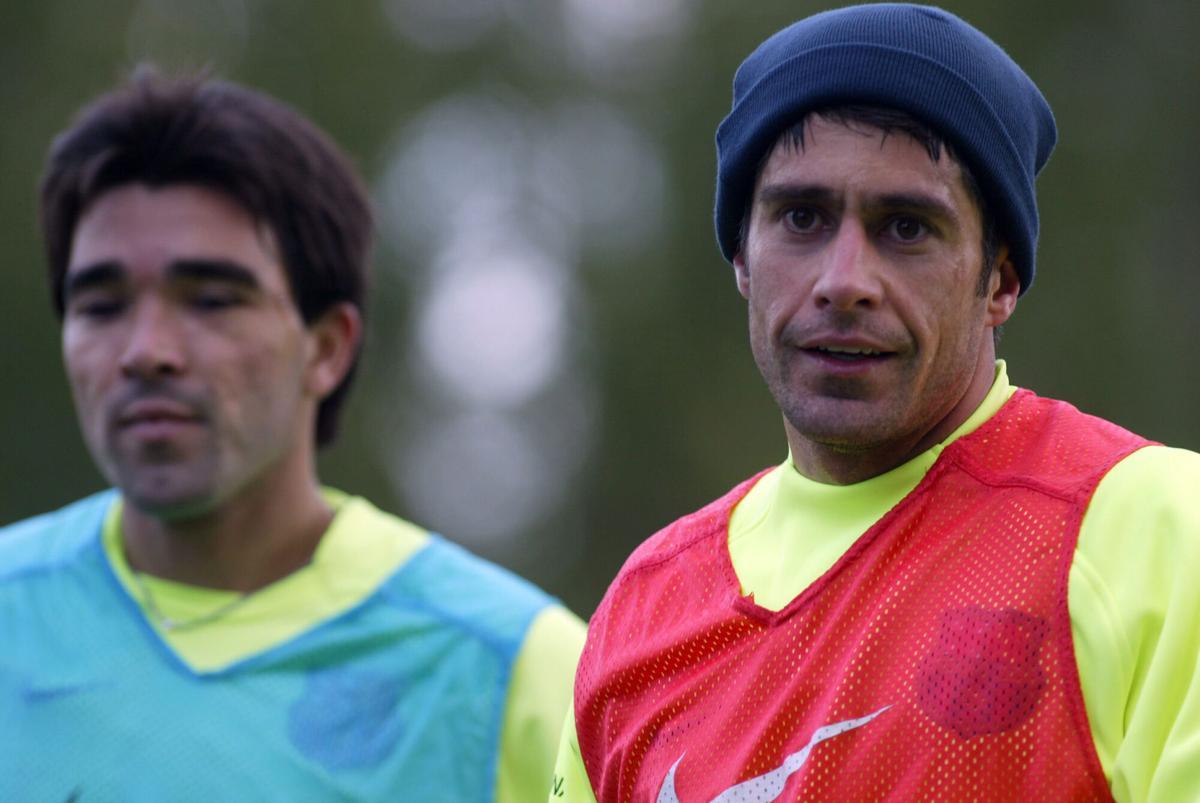Sylvinho junto a Deco